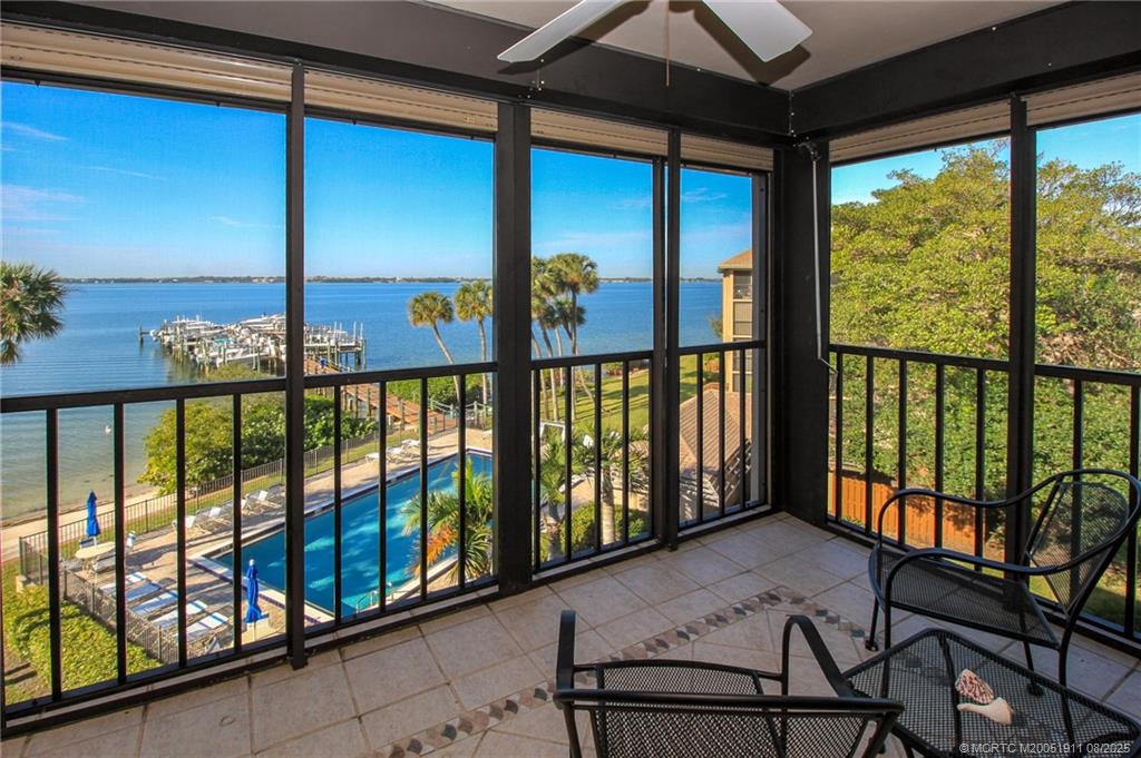 4540 Northeast Sandpebble Trace, Unit 406 Stuart, FL 34996 - Photo 10 of 36 a view of a city from a balcony