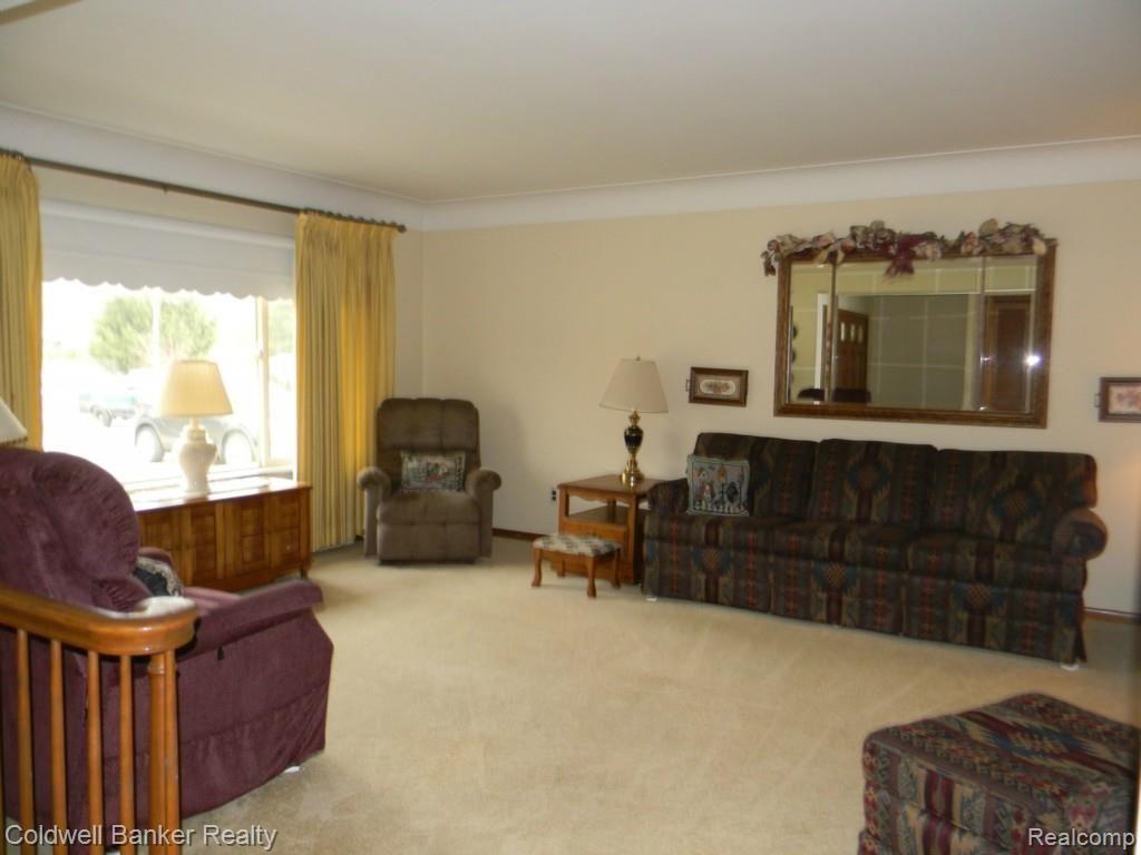 Spacious Living Room with Cove Ceilings