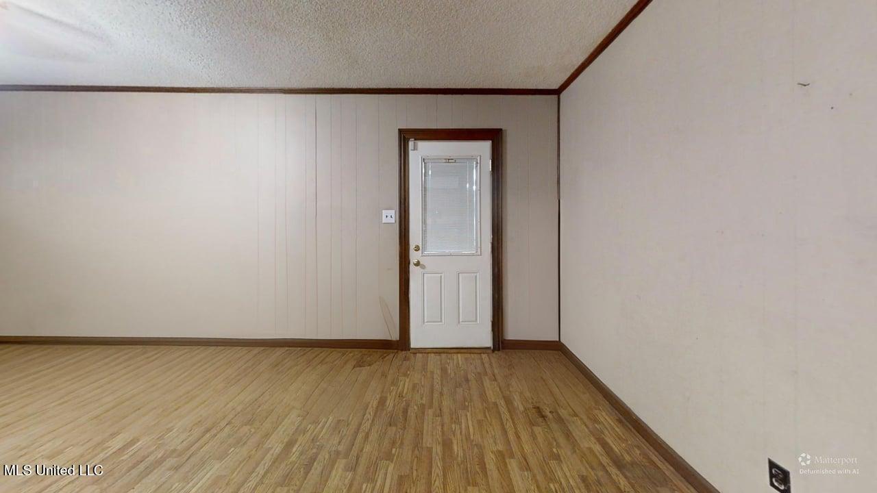 9338 East Broadway Road Olive Branch, MS 38654 - Photo 14 of 14 9338-E-Broadway-Rd-Living-Room-Defurnish