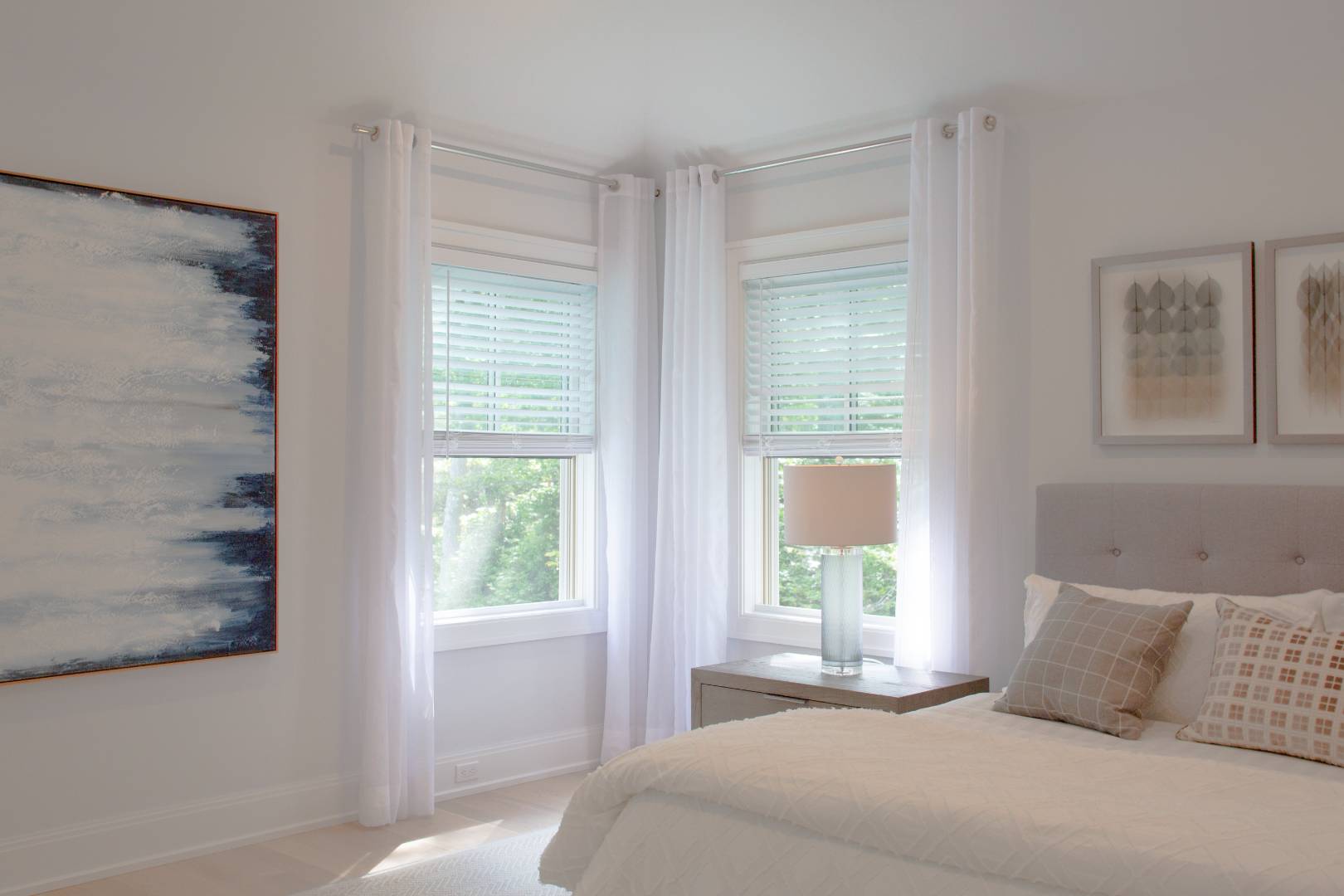 12 Sellentin Way Bridgehampton, NY 11932 - Photo 18 of 49 a bedroom with a large bed and a window