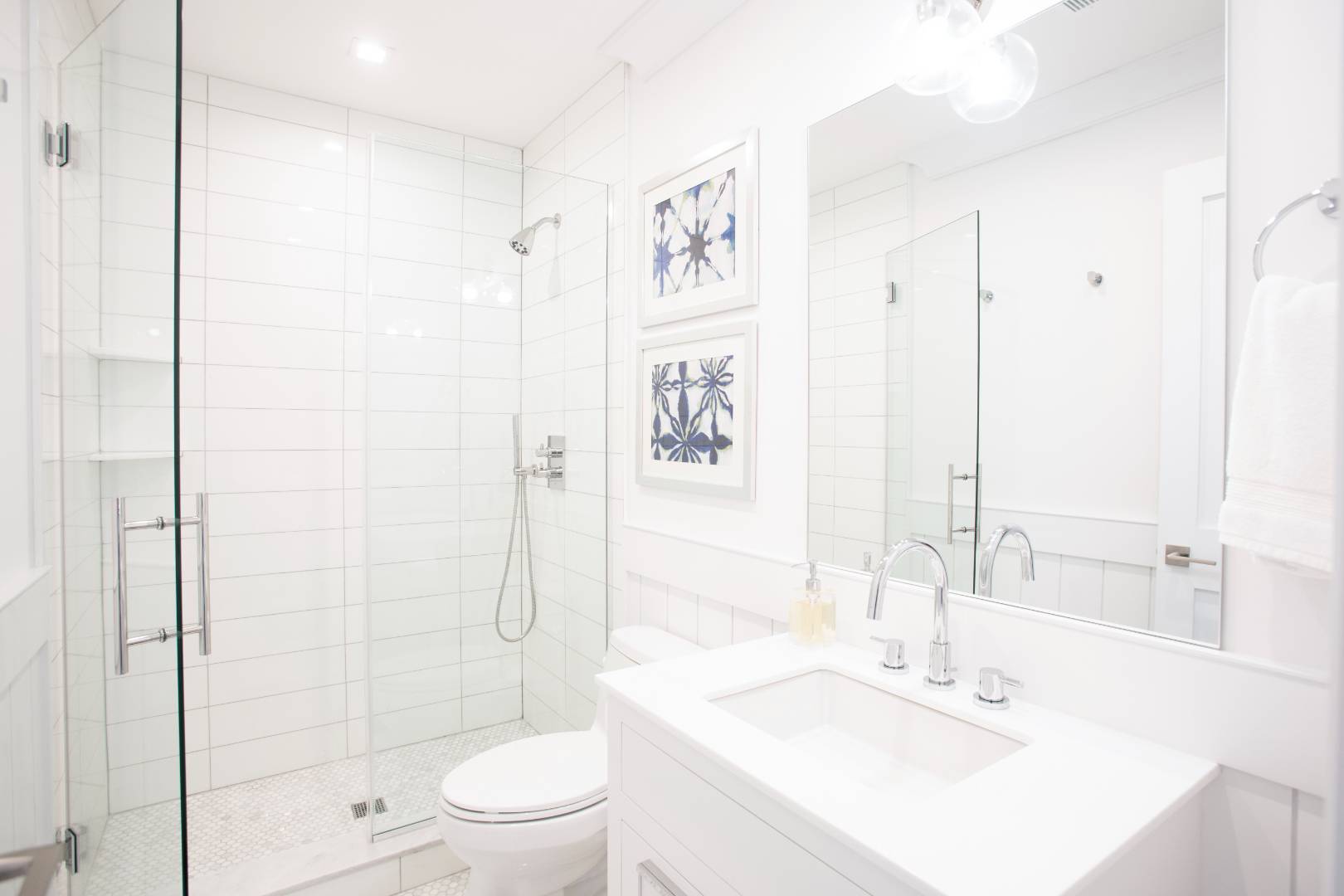 12 Sellentin Way Bridgehampton, NY 11932 - Photo 27 of 49 a bathroom with a sink a toilet and shower