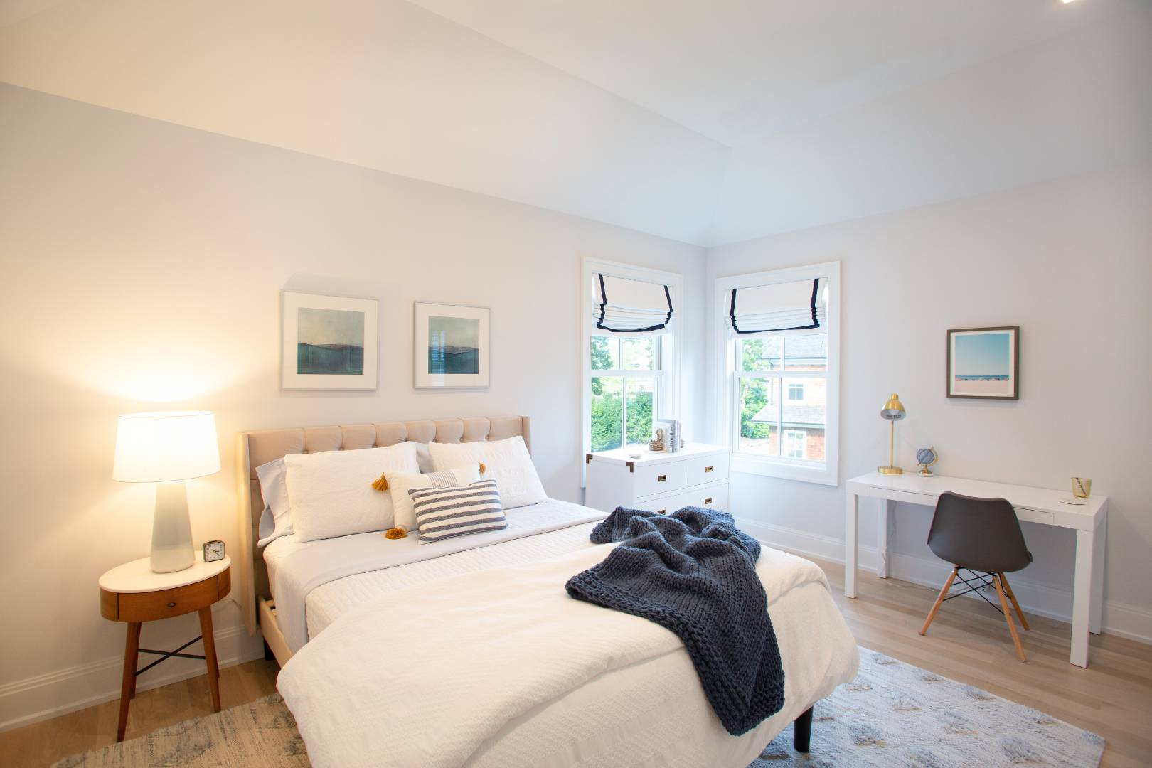 12 Sellentin Way Bridgehampton, NY 11932 - Photo 28 of 49 a bedroom with a bed a table window and chair