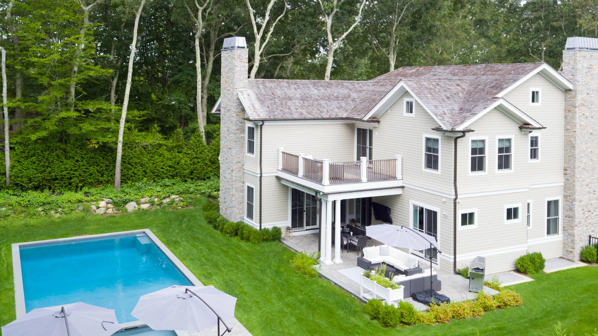 12 Sellentin Way Bridgehampton, NY 11932 - Photo 4 of 49 a aerial view of a house with a yard patio and a garden