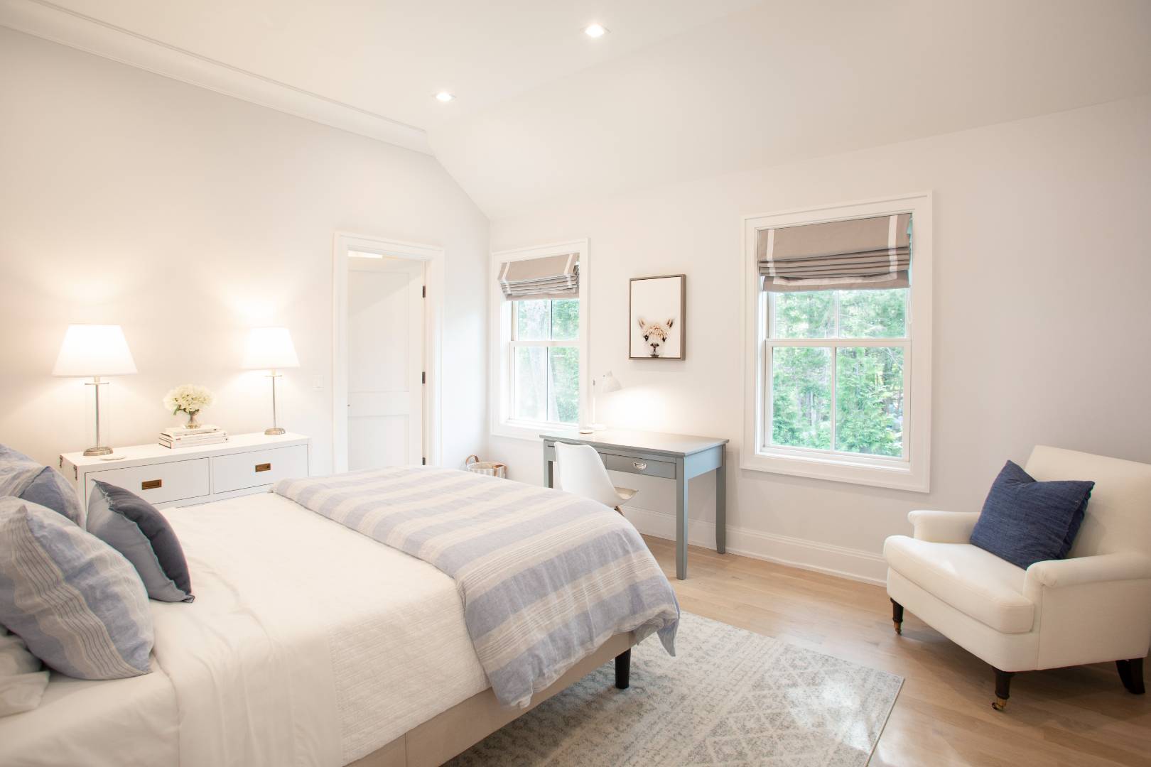 12 Sellentin Way Bridgehampton, NY 11932 - Photo 31 of 49 a spacious bedroom with a bed and a couch