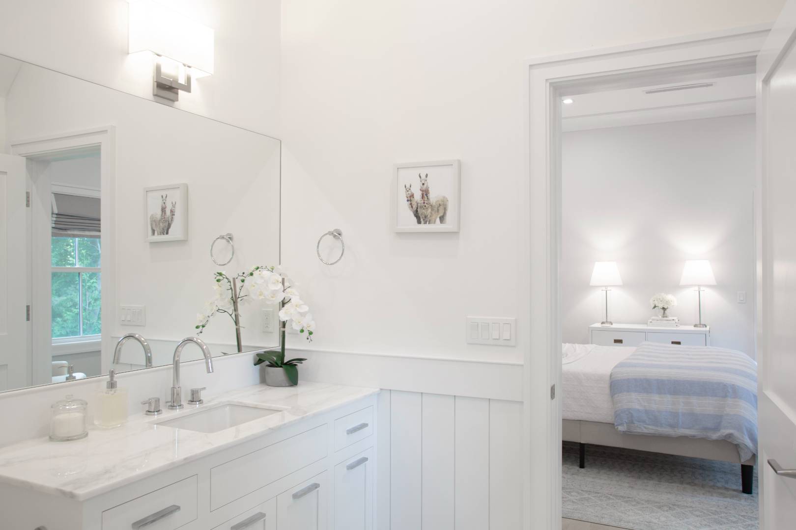 12 Sellentin Way Bridgehampton, NY 11932 - Photo 35 of 49 a en suite bathroom with a double vanity sink and mirror