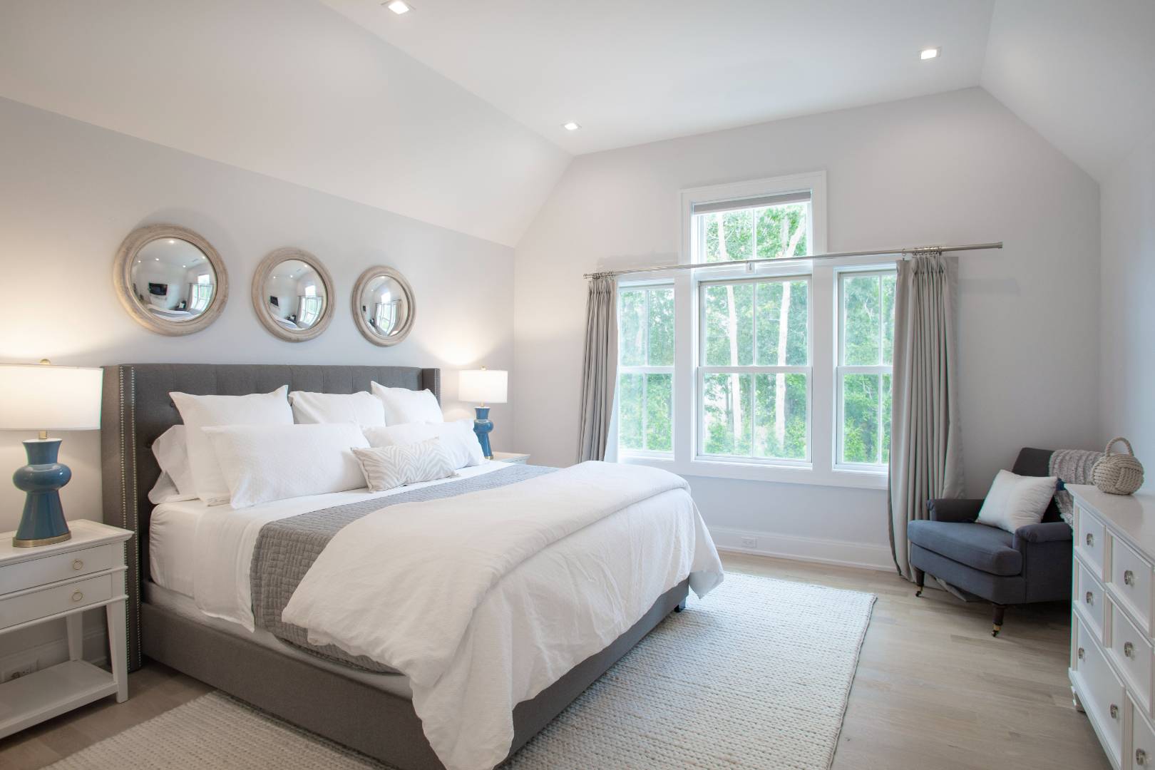 12 Sellentin Way Bridgehampton, NY 11932 - Photo 36 of 49 a bedroom with a bed and a window