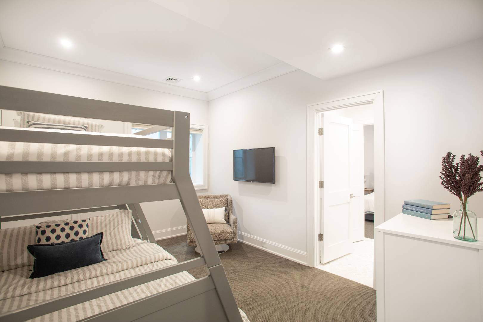 12 Sellentin Way Bridgehampton, NY 11932 - Photo 41 of 49 a living room with furniture and a flat screen tv