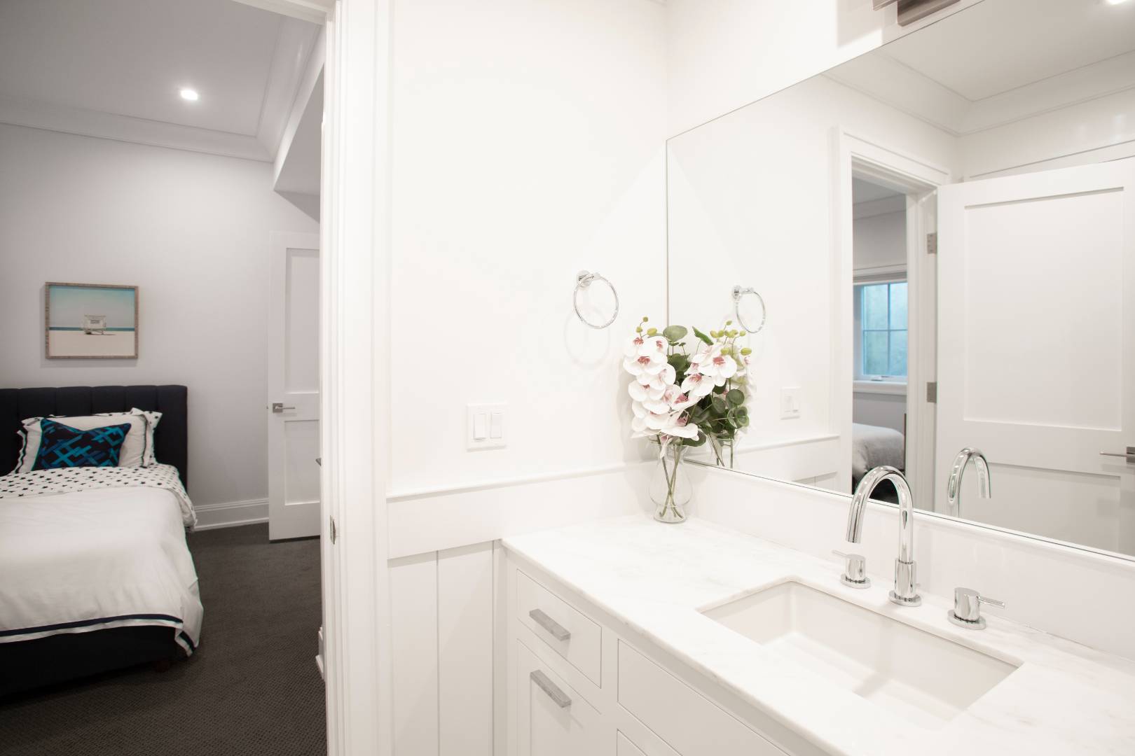 12 Sellentin Way Bridgehampton, NY 11932 - Photo 43 of 49 a en suite bathroom with a sink and a mirror