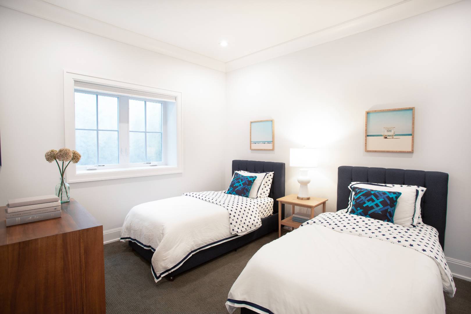 12 Sellentin Way Bridgehampton, NY 11932 - Photo 44 of 49 a bedroom with two beds and a window