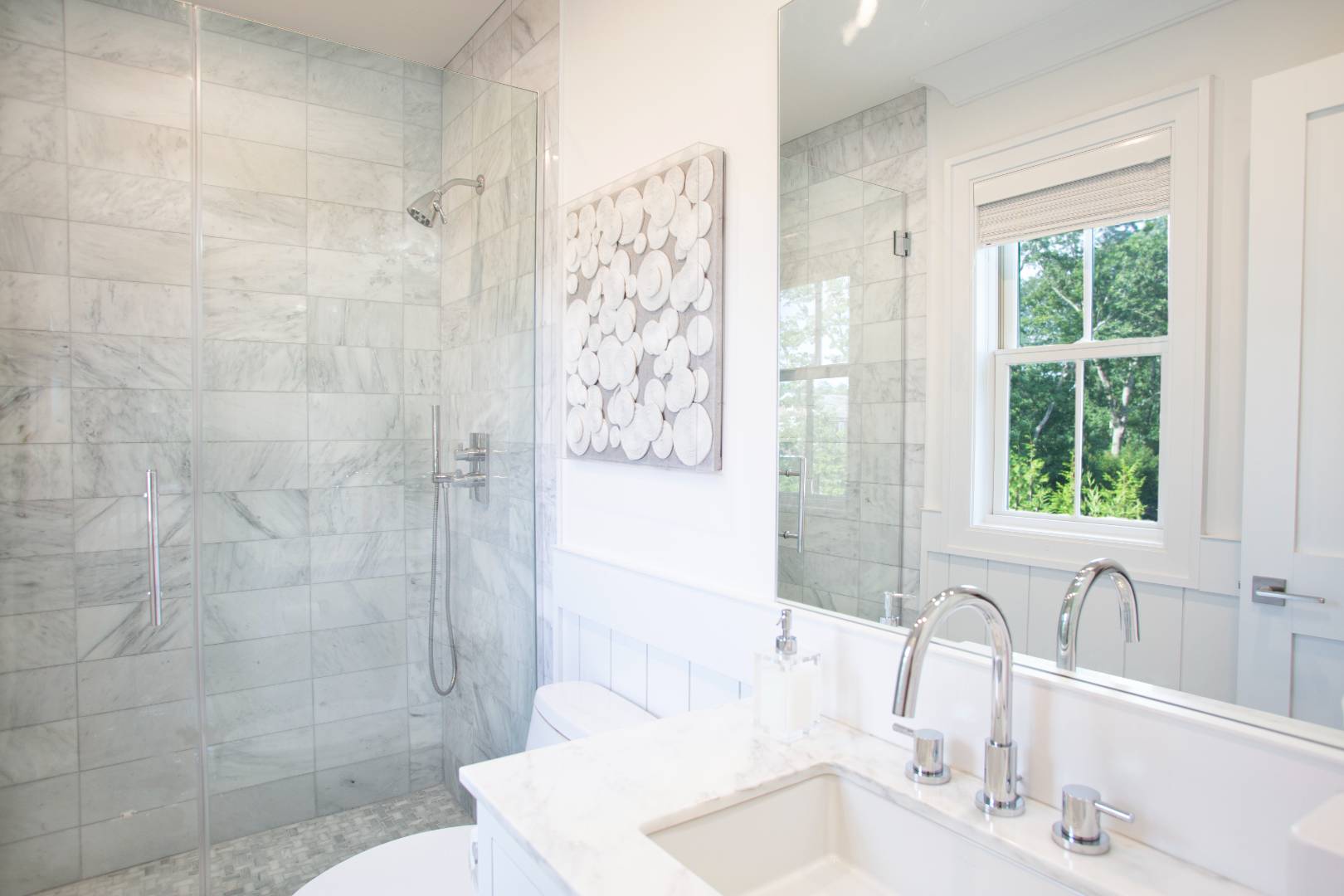 12 Sellentin Way Bridgehampton, NY 11932 - Photo 45 of 49 a bathroom with a sink and a tub