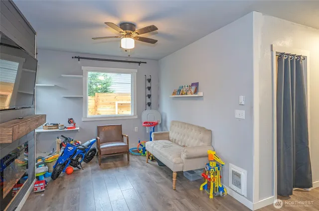 a living room with furniture and a window