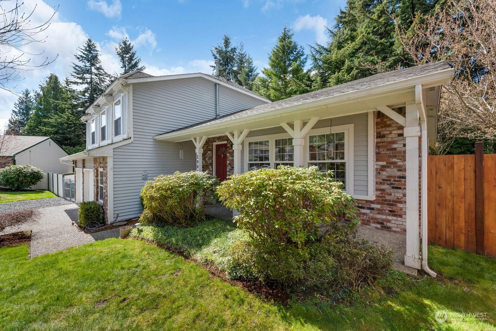 2904 167th Street Southeast Bothell, WA 98012 - Photo 3 of 40 a front view of a house with garden