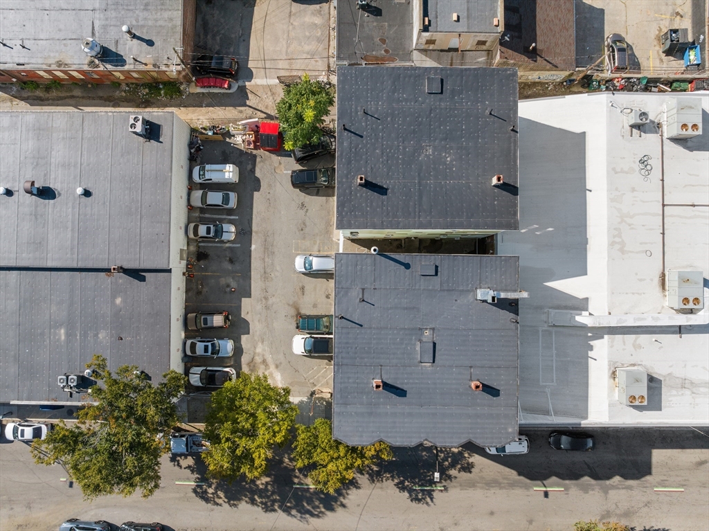 50 Common Street, Unit 5 Lawrence, MA 01840 - Photo 27 of 28 an aerial view of residential houses with outdoor space