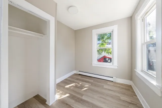 an empty room with windows