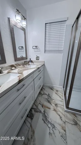 a bathroom with a tub and shower