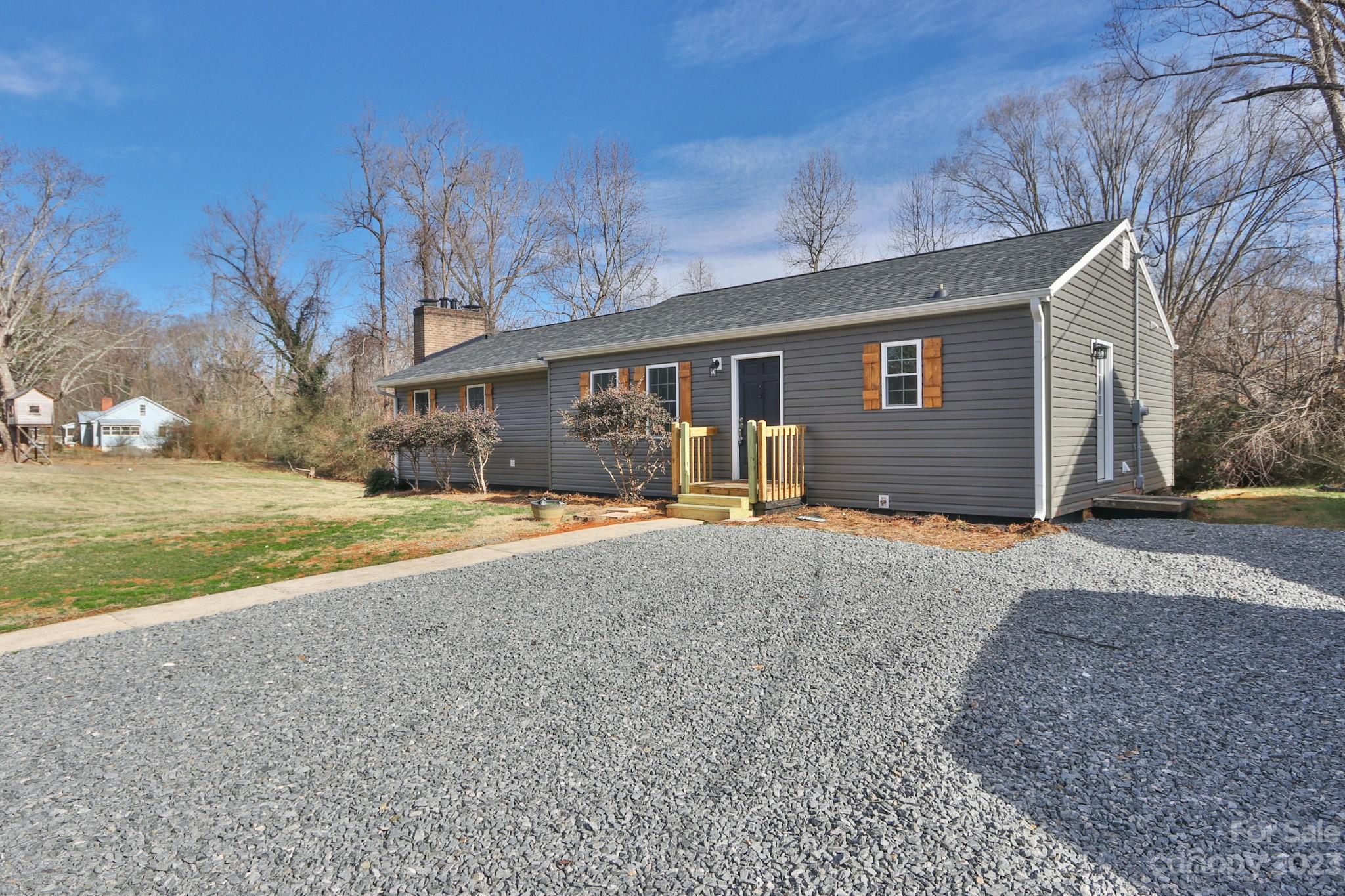219 Harris Avenue Elkin, NC 28621 - Photo 1 of 48 a house view with backyard space