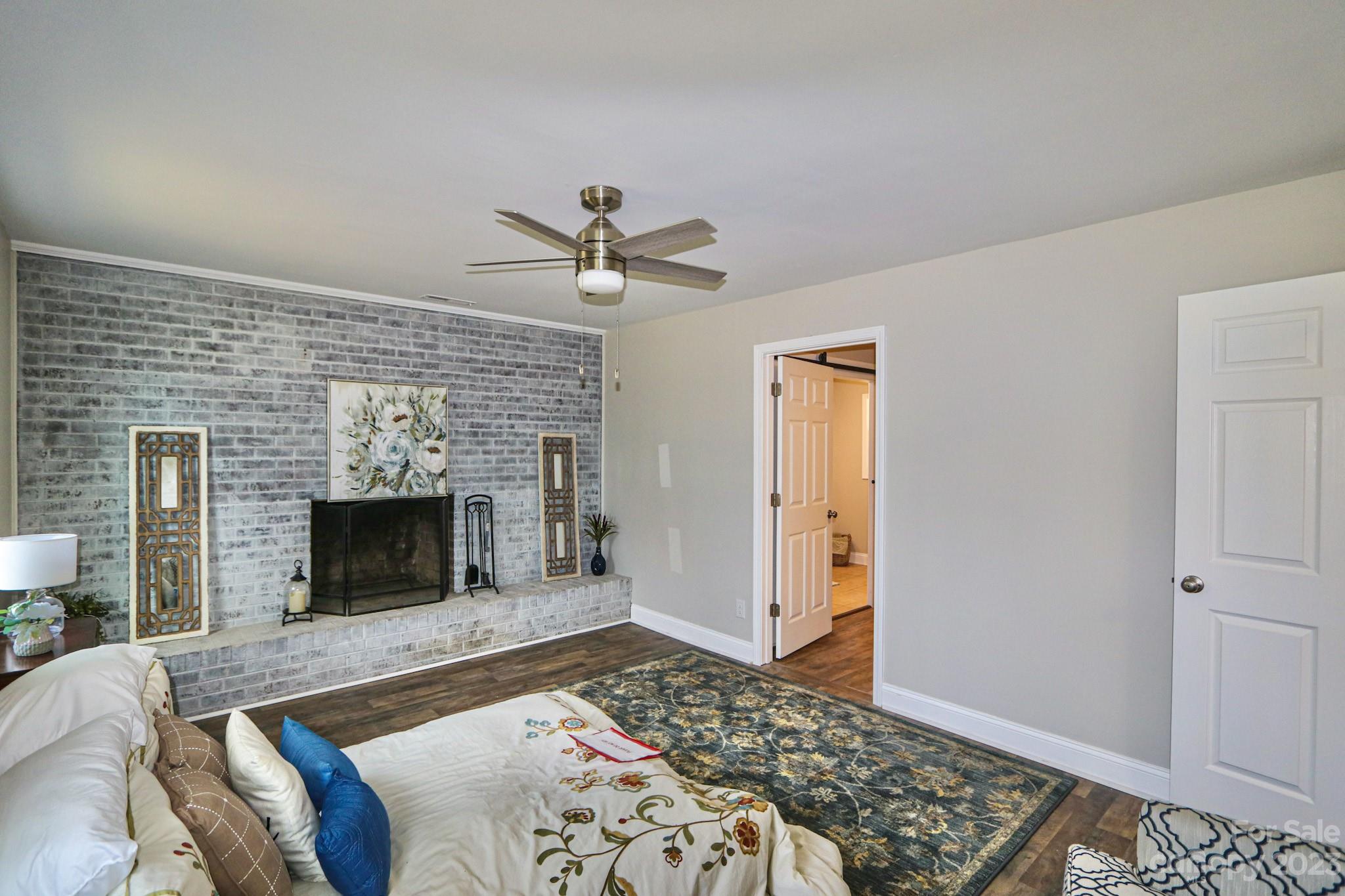 219 Harris Avenue Elkin, NC 28621 - Photo 15 of 48 a living room with furniture and a fireplace