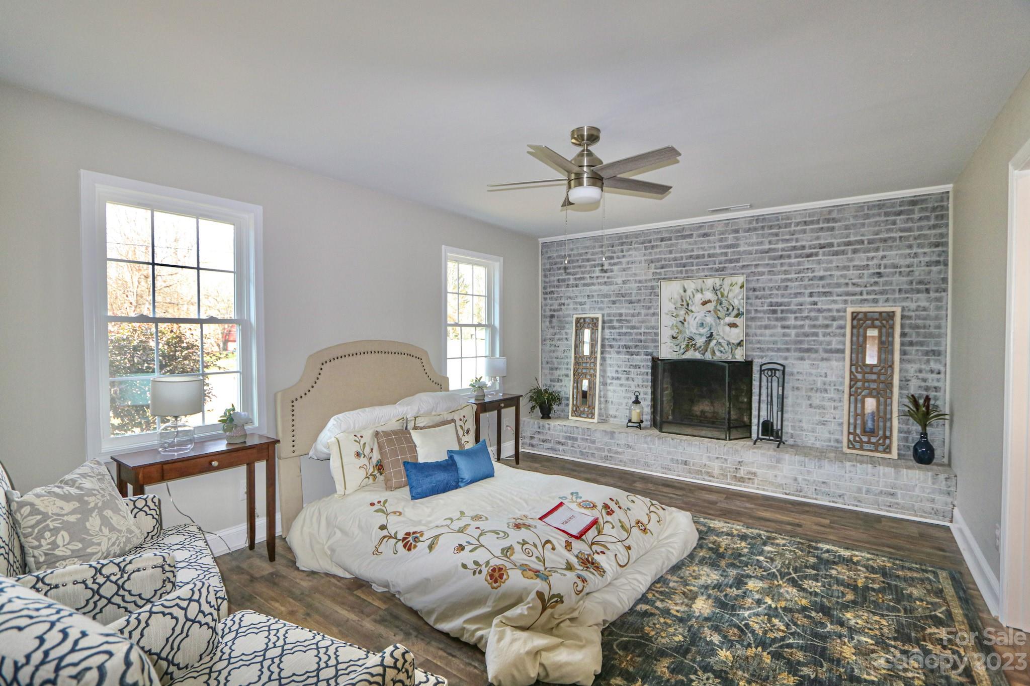 219 Harris Avenue Elkin, NC 28621 - Photo 2 of 48 a living room with furniture and a fireplace
