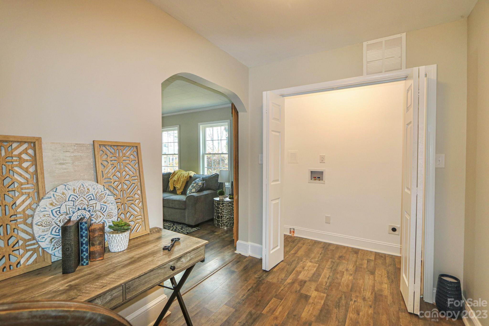 219 Harris Avenue Elkin, NC 28621 - Photo 24 of 48 a view of a livingroom with furniture and hardwood floor