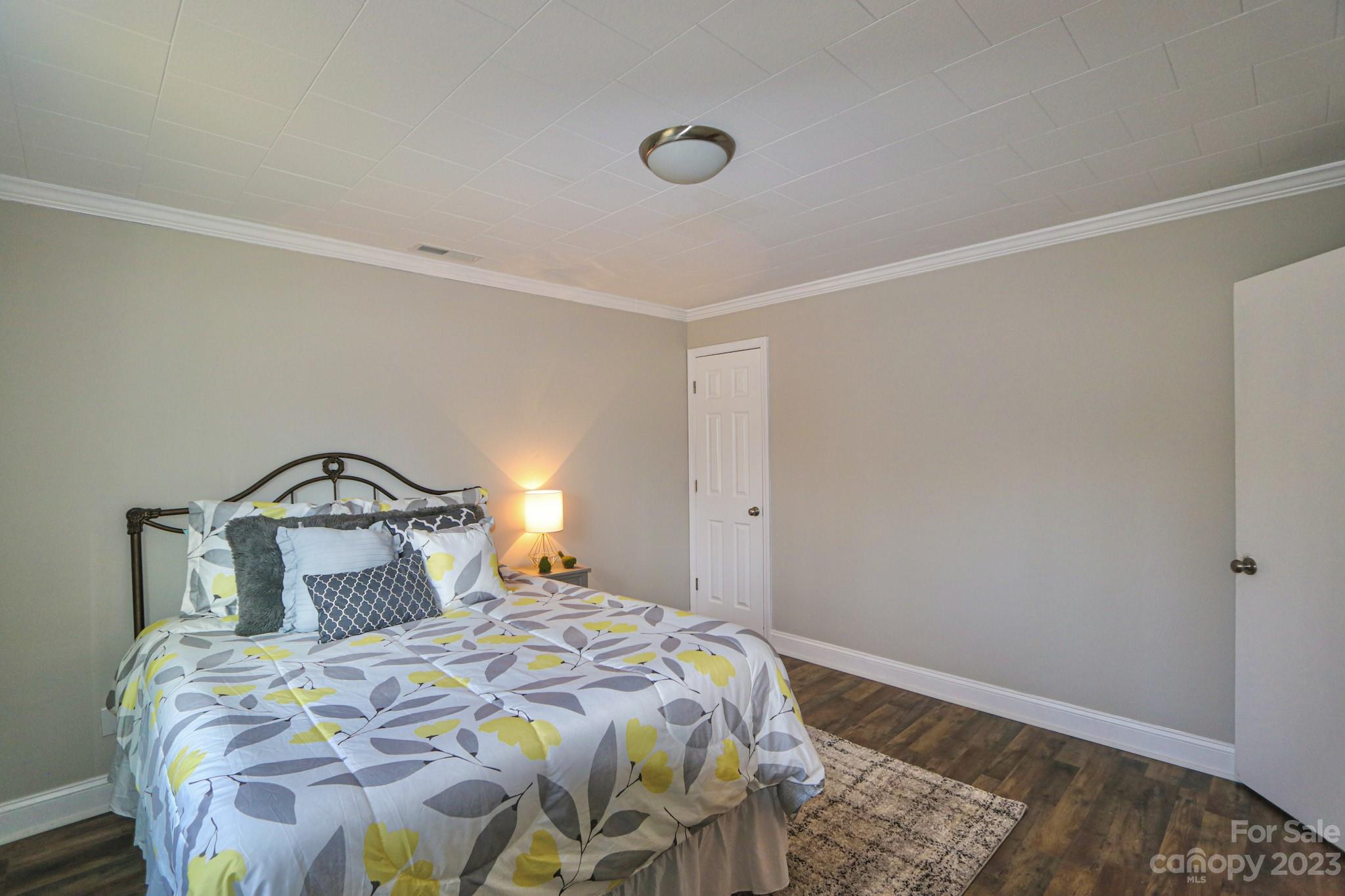 219 Harris Avenue Elkin, NC 28621 - Photo 27 of 48 a bedroom with a bed and a window