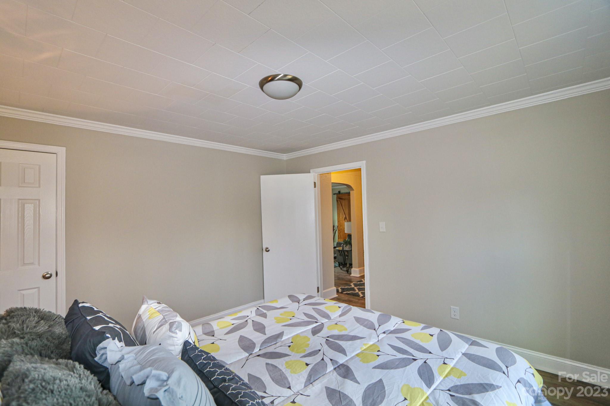 219 Harris Avenue Elkin, NC 28621 - Photo 28 of 48 a bedroom with a bed and a window