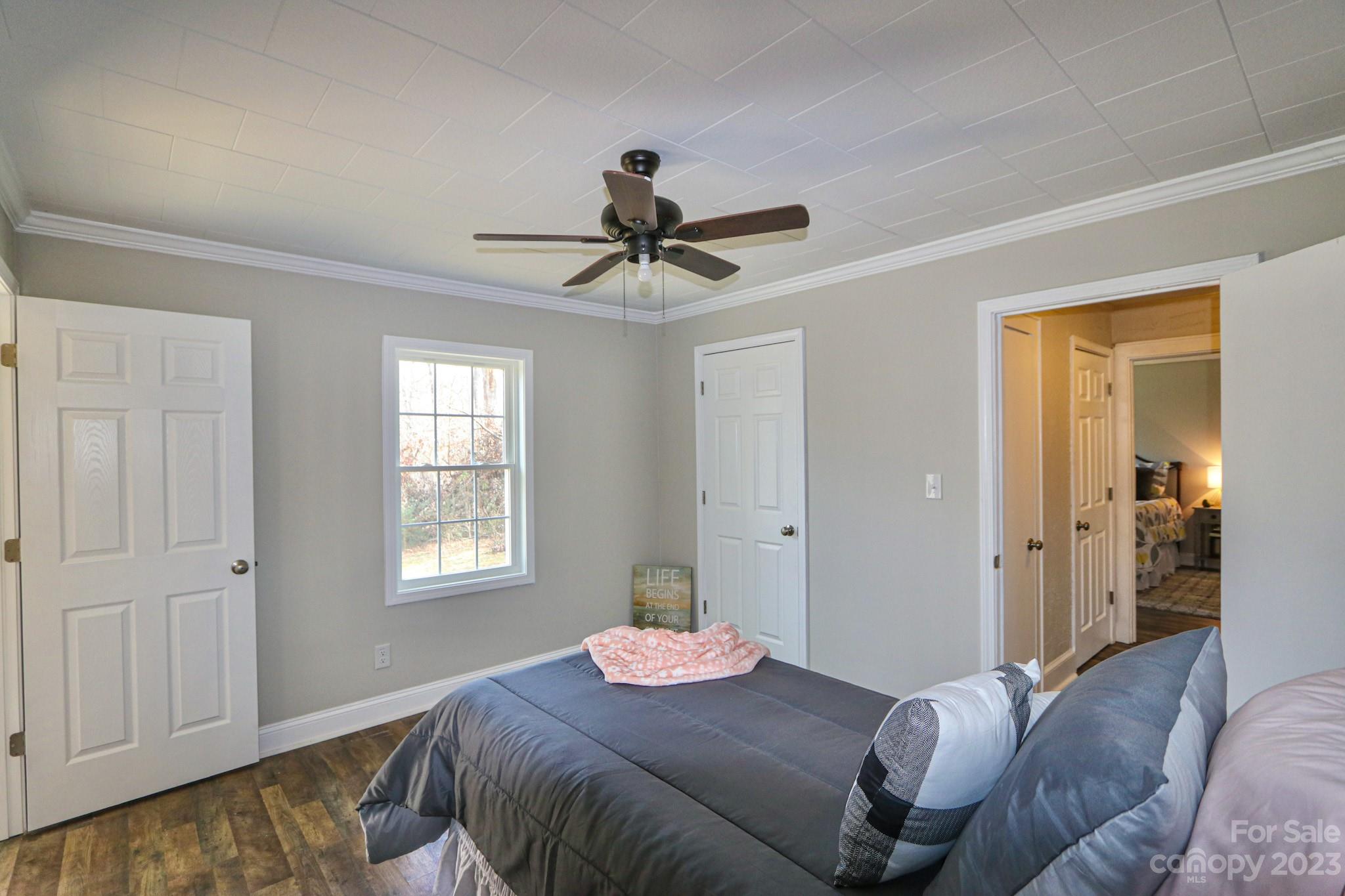 219 Harris Avenue Elkin, NC 28621 - Photo 32 of 48 a bedroom with bed and a window