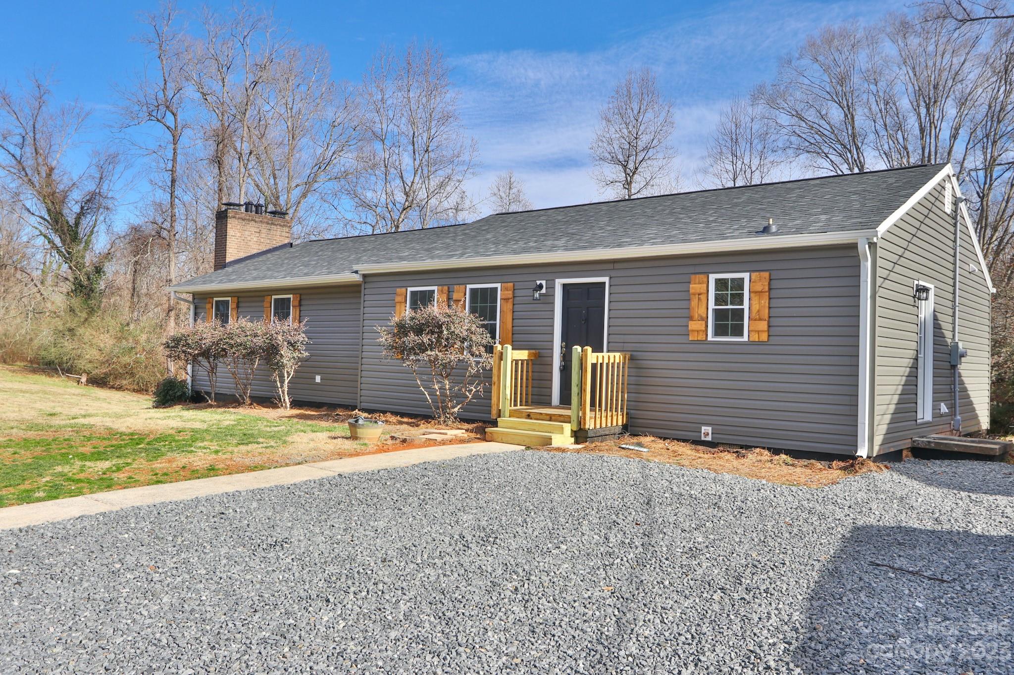 219 Harris Avenue Elkin, NC 28621 - Photo 47 of 48 a house with a outdoor space