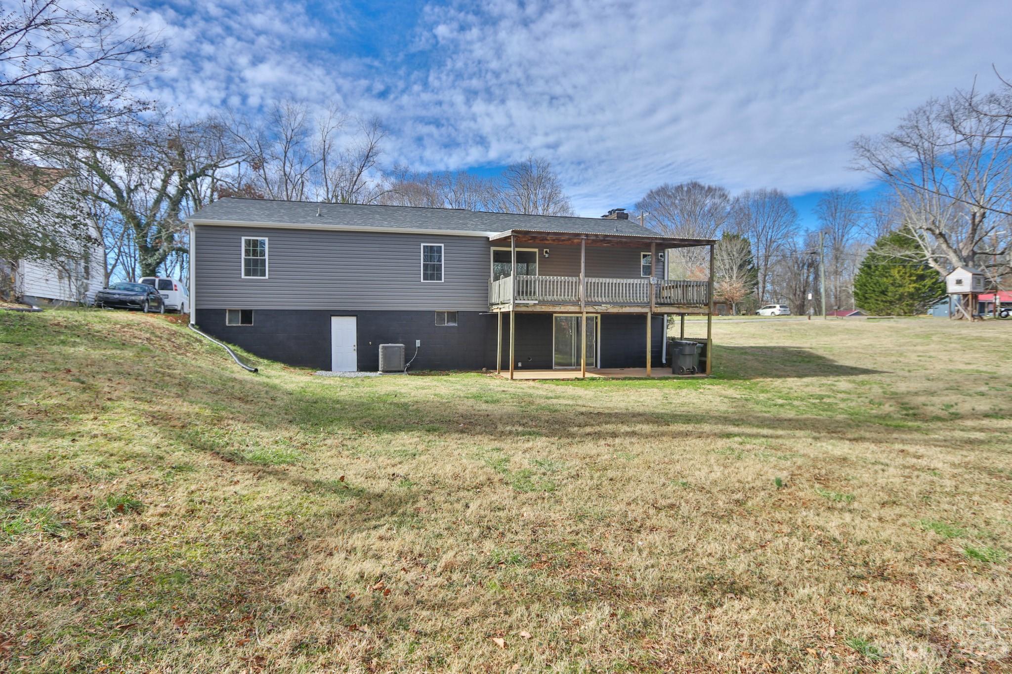 219 Harris Avenue Elkin, NC 28621 - Photo 6 of 48 a front view of a house with a yard
