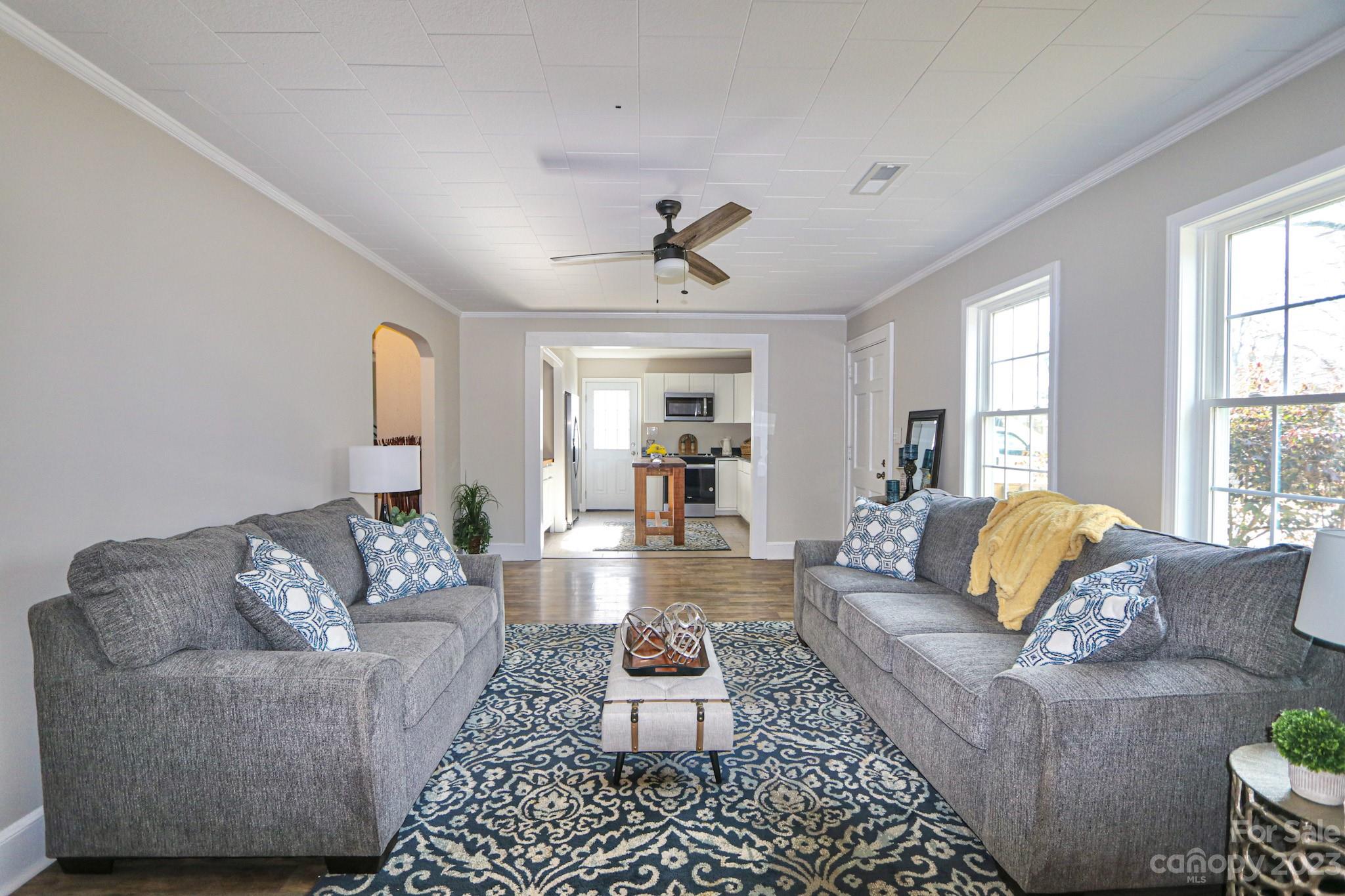 219 Harris Avenue Elkin, NC 28621 - Photo 7 of 48 a living room with furniture and a large window