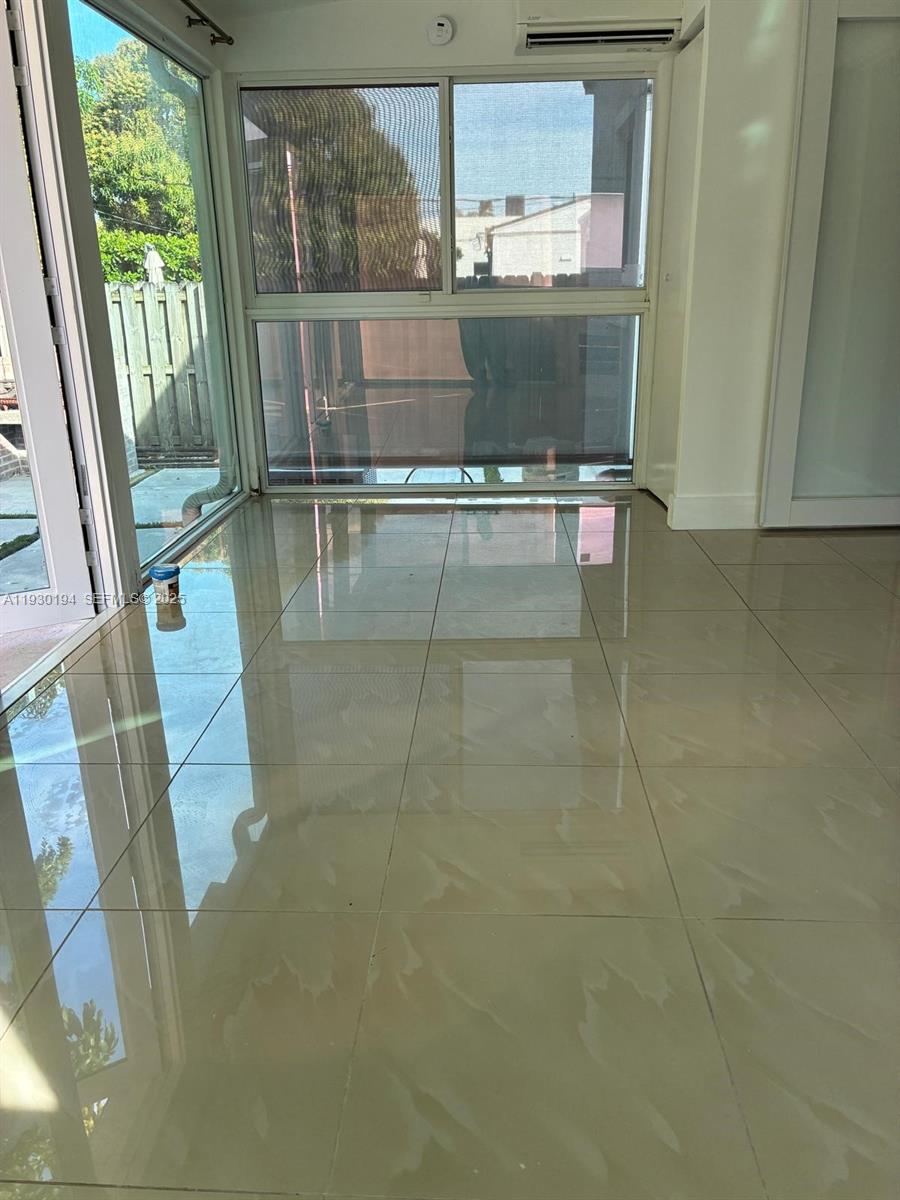 1757 Southwest 24th Terrace Miami, FL 33145 - Photo 17 of 40 a view of a bathroom with a sink and a mirror