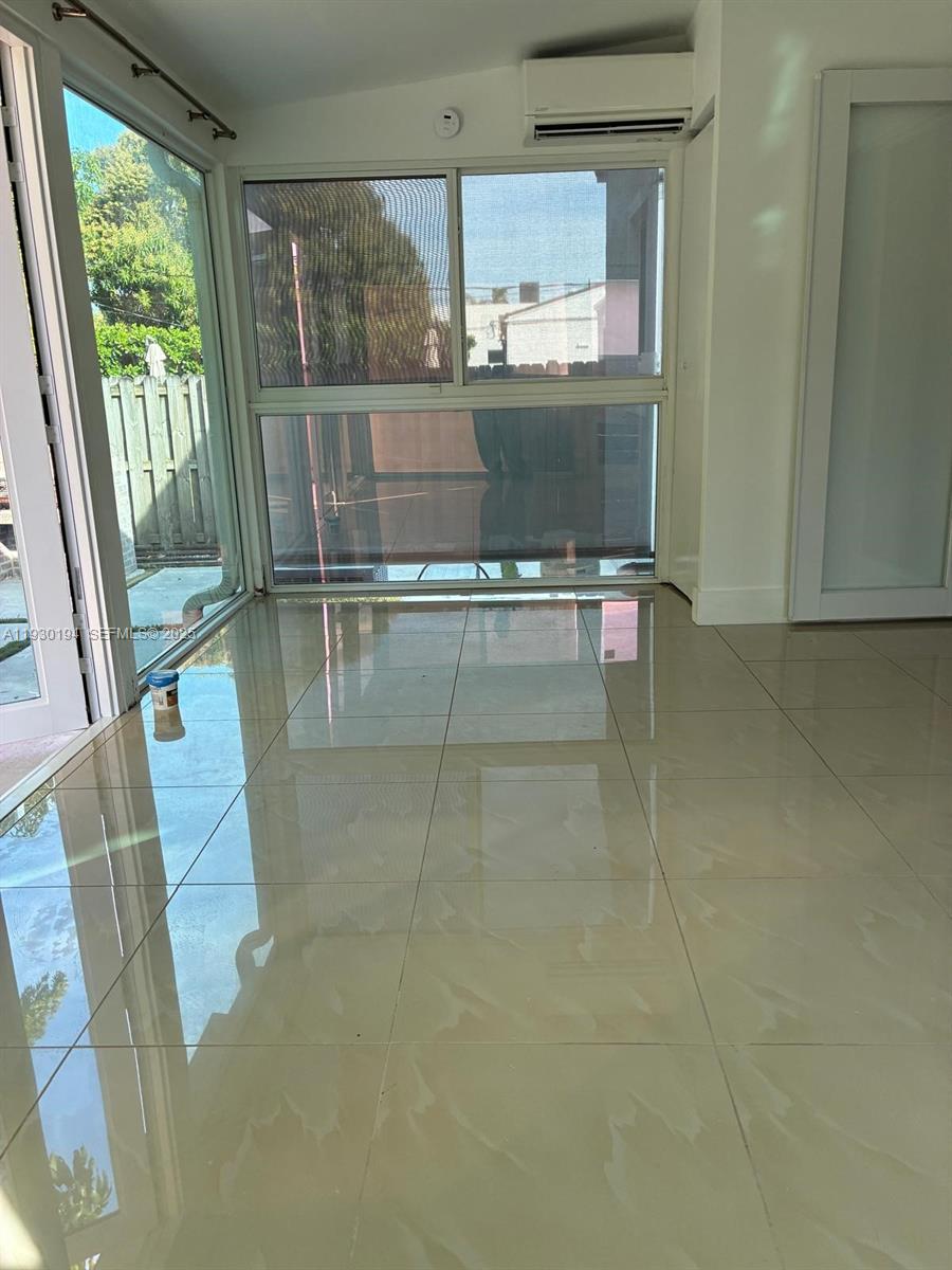 1757 Southwest 24th Terrace Miami, FL 33145 - Photo 18 of 40 view of living room with granite countertop furniture and fireplace
