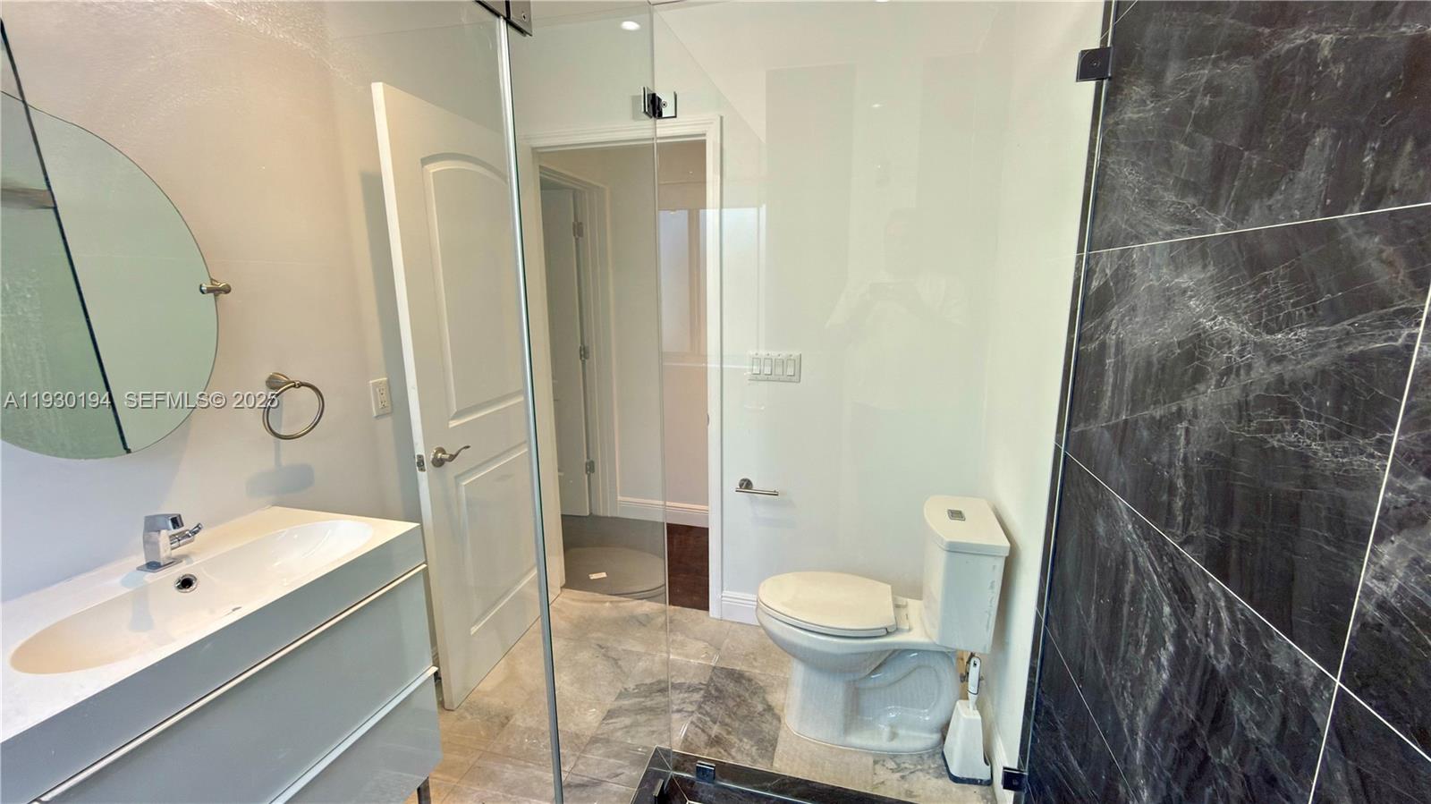 1757 Southwest 24th Terrace Miami, FL 33145 - Photo 22 of 37 a bathroom with a sink toilet and shower