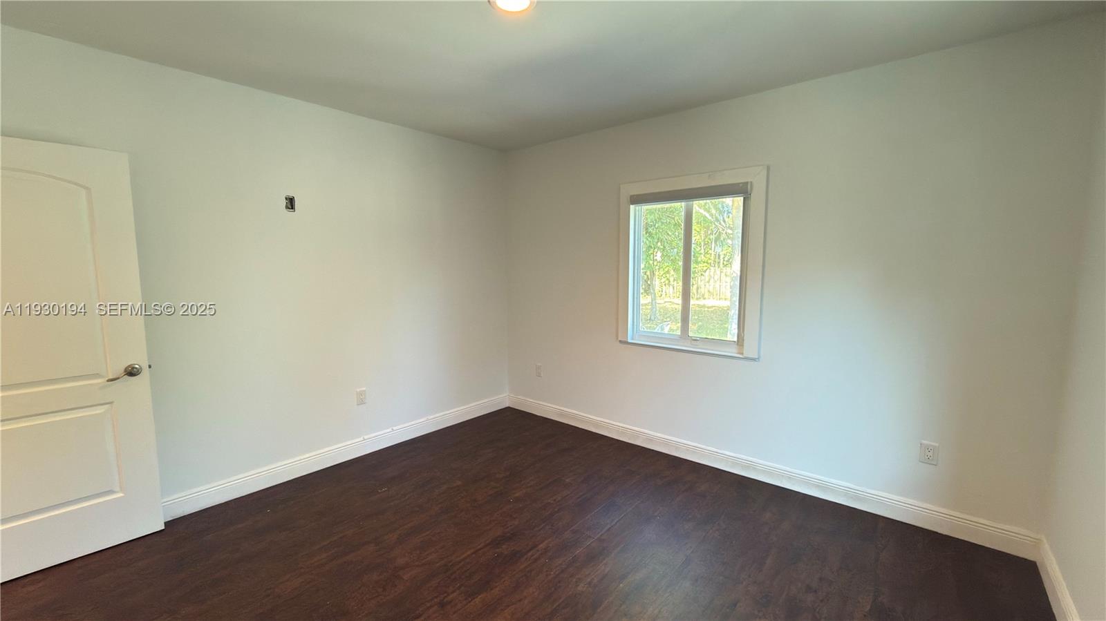 1757 Southwest 24th Terrace Miami, FL 33145 - Photo 28 of 37 an empty room with a window