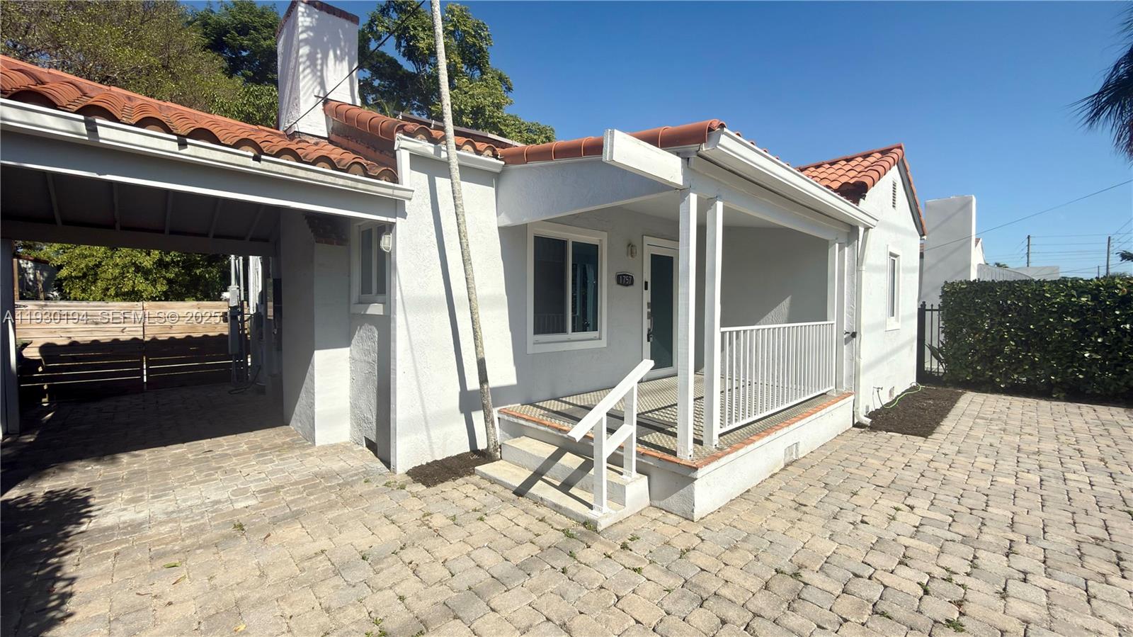 1757 Southwest 24th Terrace Miami, FL 33145 - Photo 3 of 37 a view of a balcony with chairs and front door