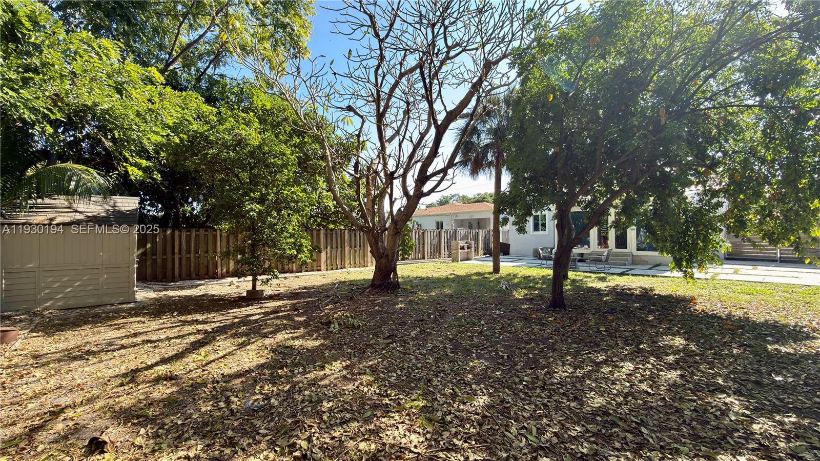 1757 Southwest 24th Terrace Miami, FL 33145 - Photo 33 of 37 a view of a tree in the middle of a yard
