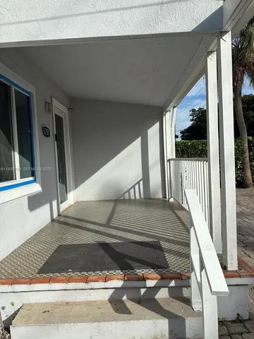 a view of a backyard of a house