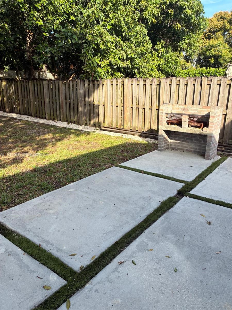 1757 Southwest 24th Terrace Miami, FL 33145 - Photo 37 of 40 a view of a backyard with wooden fence
