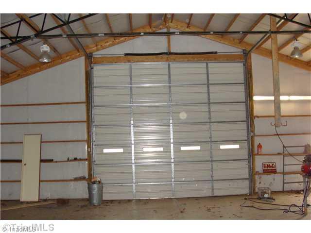 1933 Eldora Road Ararat, NC 27007 - Photo 8 of 9 Interior Space/Layout. Overhead Door