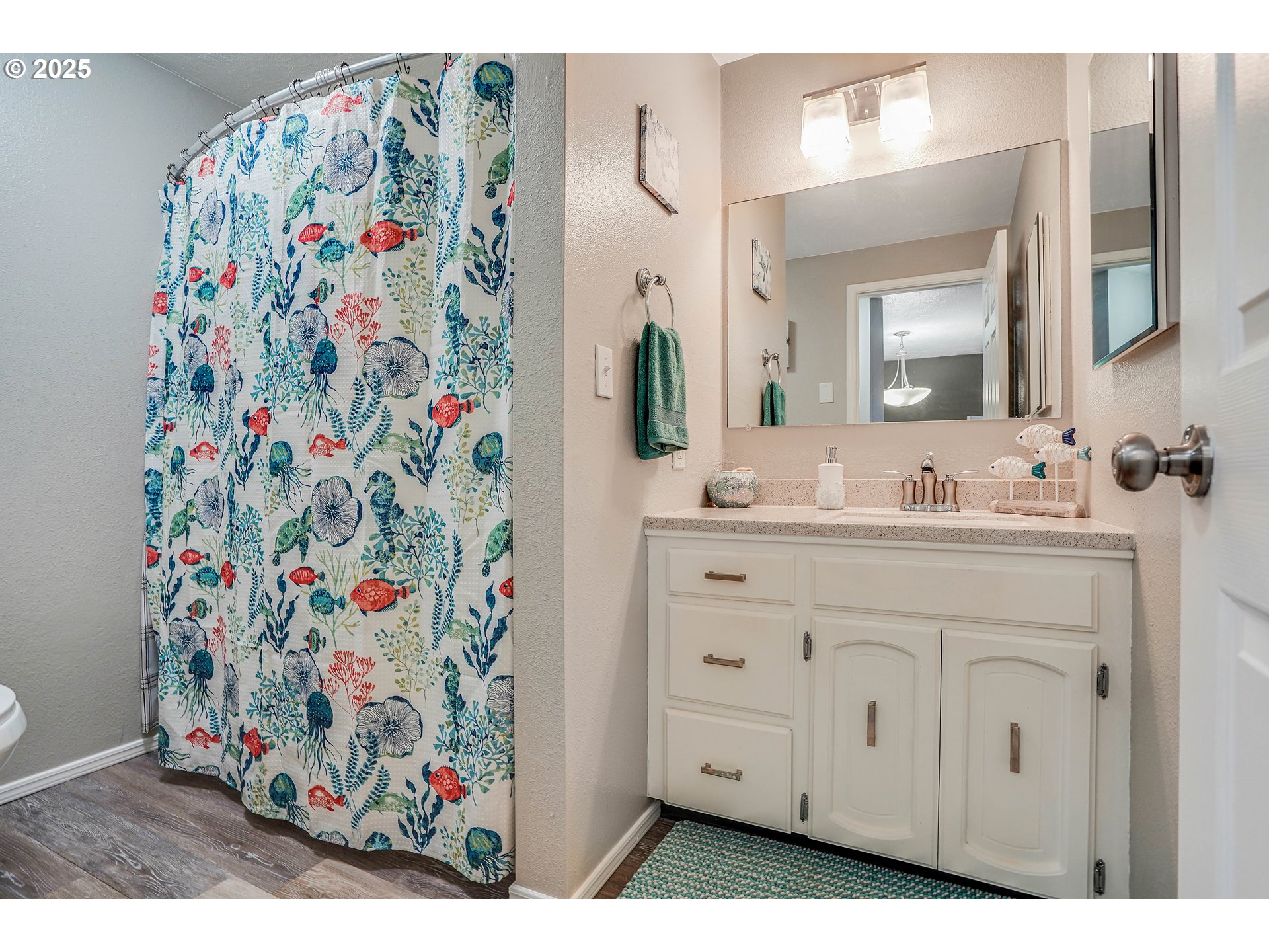 4495 Madrona Way Southeast Albany, OR 97322 - Photo 21 of 29 a bathroom with a sink and a mirror