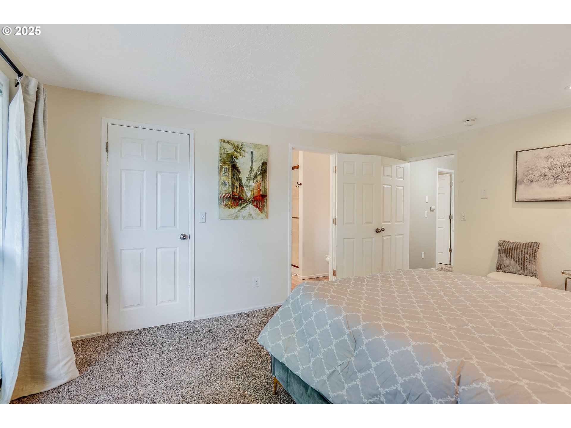 4495 Madrona Way Southeast Albany, OR 97322 - Photo 25 of 29 a bedroom with a bed and painting on the wall