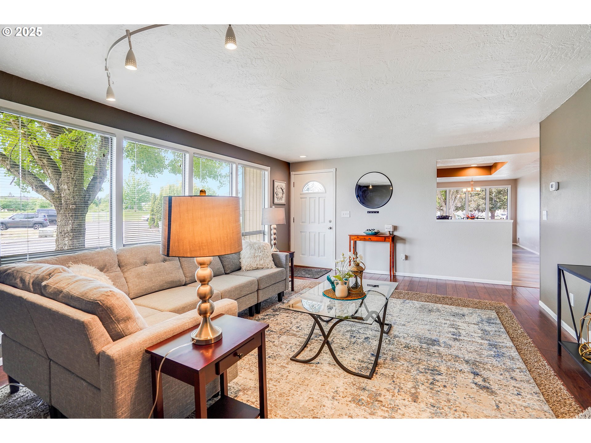 4495 Madrona Way Southeast Albany, OR 97322 - Photo 6 of 29 a living room with furniture and a large window