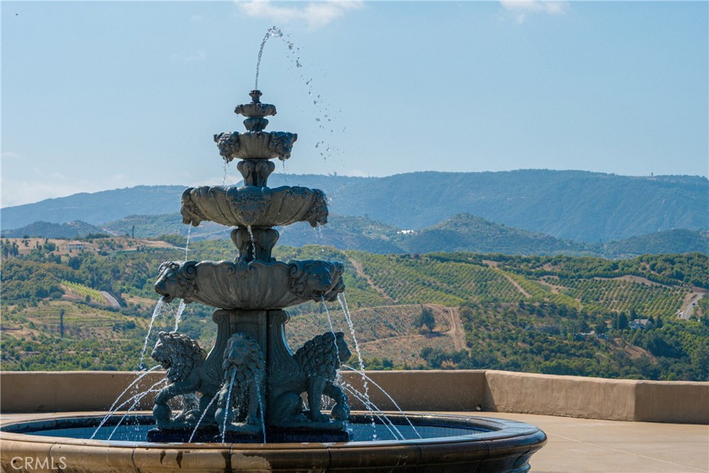46856 El Prado Road Temecula, CA 92590 - Photo 72 of 75 a view of a fountain in the middle of a yard