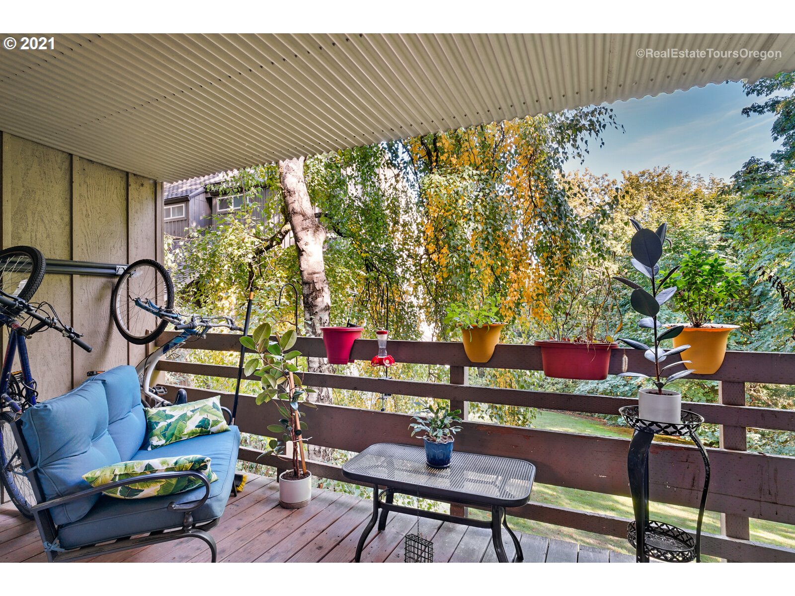 100 Kerr Parkway, Unit 19 Lake Oswego, OR 97035 - Photo 13 of 32 a outdoor living space with furniture and a potted plant