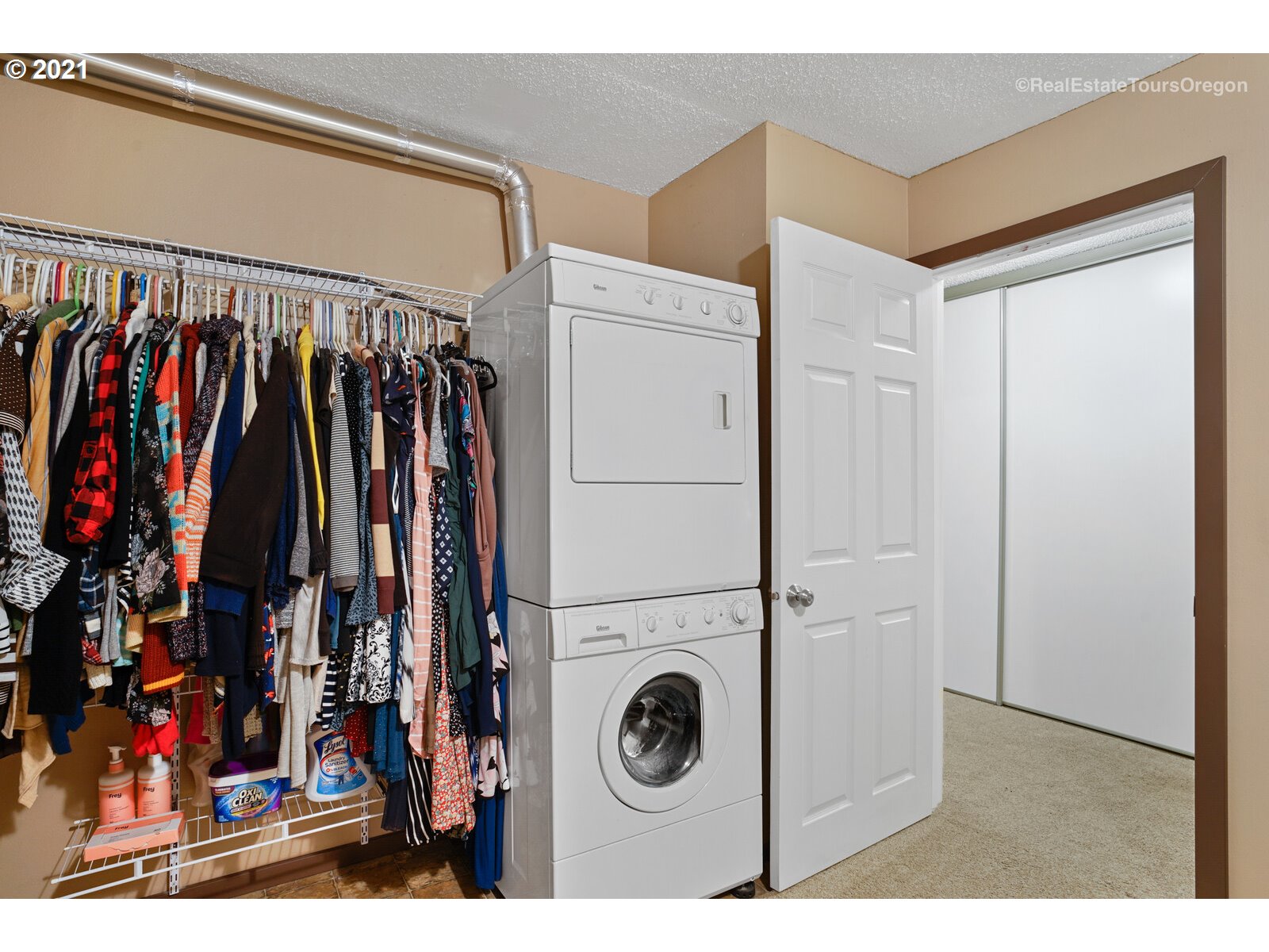 100 Kerr Parkway, Unit 19 Lake Oswego, OR 97035 - Photo 24 of 32 a view of walk in closet with clothes and shoes