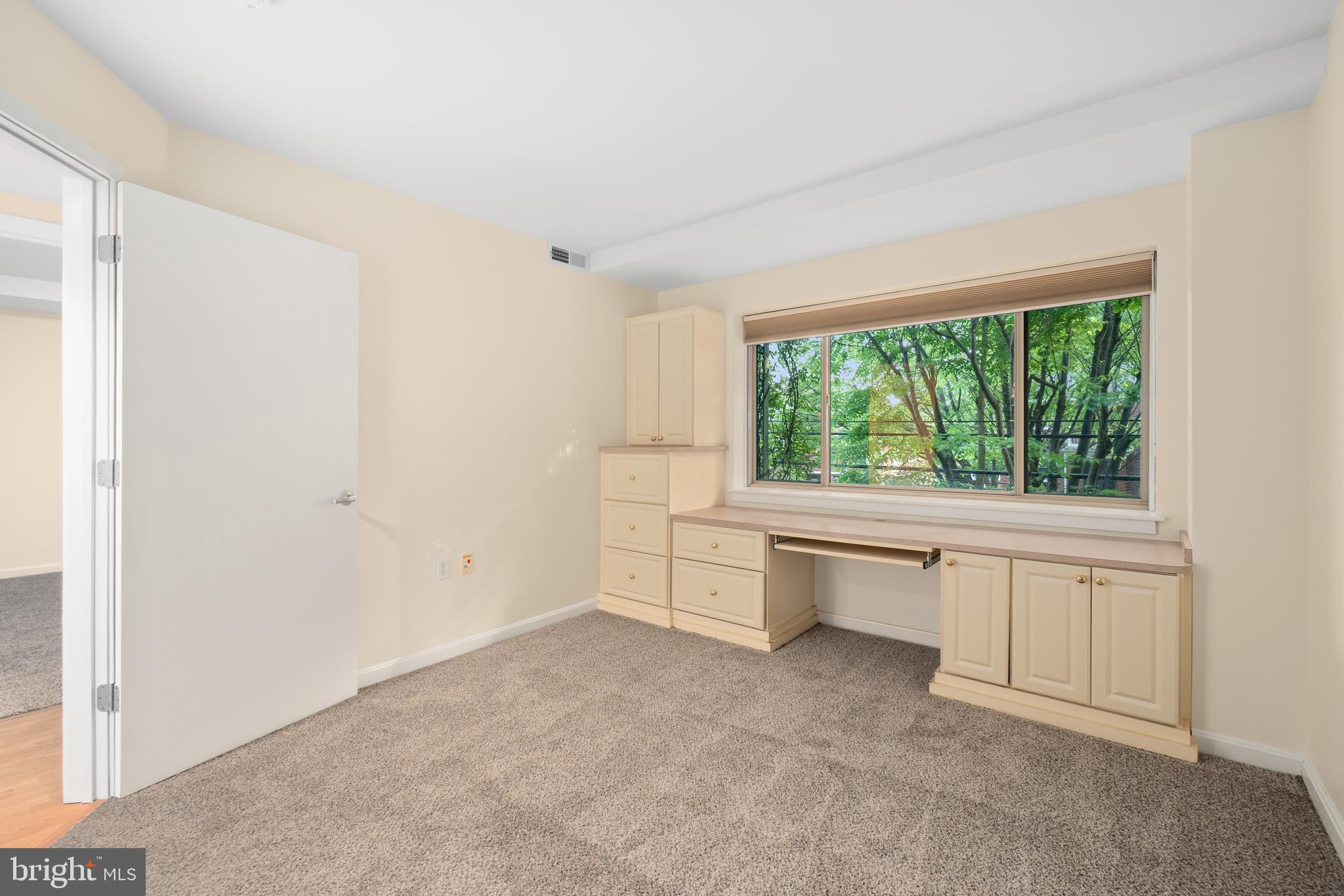 7981 Eastern Avenue Northwest, Unit 219 Silver Spring, MD 20910 - Photo 22 of 45 Custom built-in desk