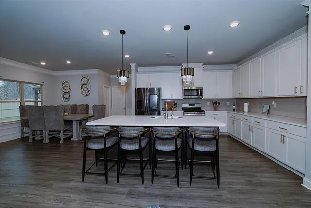 a white toilet sitting next to a shower curtain