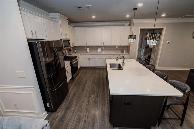 a bedroom with a bed and a ceiling fan