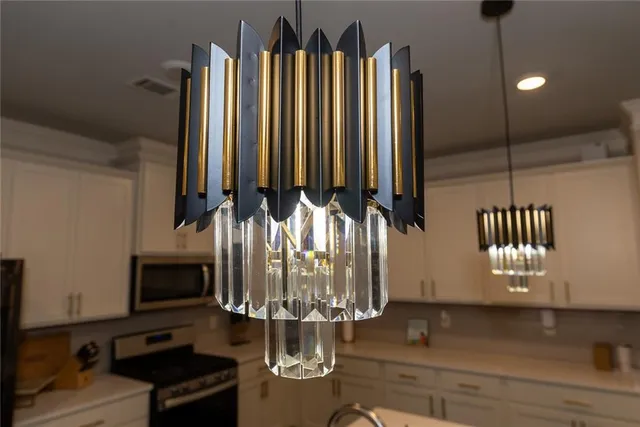 a bedroom with a bed and a ceiling fan