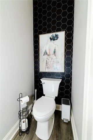 a bathroom with a shower and a sink