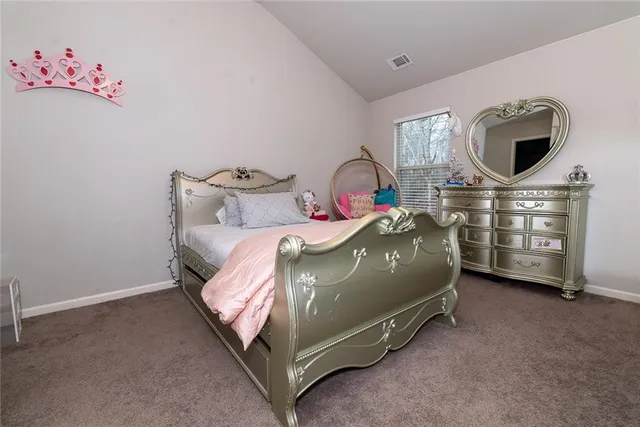 a view of a back yard of the house